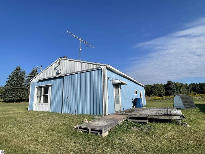 Property Photo:  6160 Meredith Grade  MI 48625 