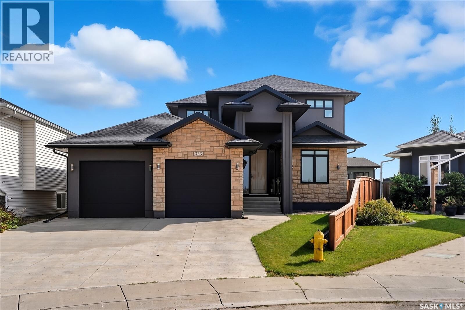 Property Photo: 323 Atton Crescent SK S7W 0K8
