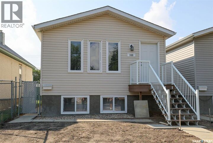 Property Photo:  348 Robinson Street  SK S4R 3R2 