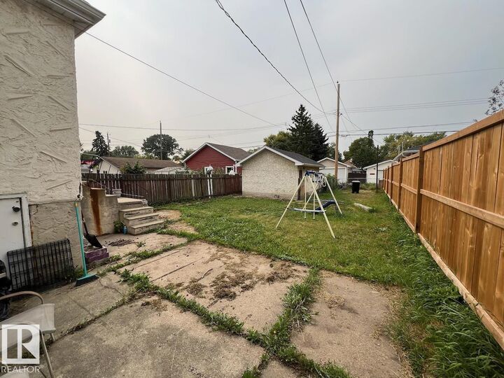 Property Photo:  11942 86 Street NW  AB T5B 3K2 