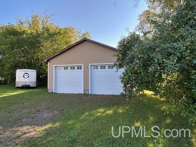 Property Photo:  46882 Naumkeg Street  MI 49905 