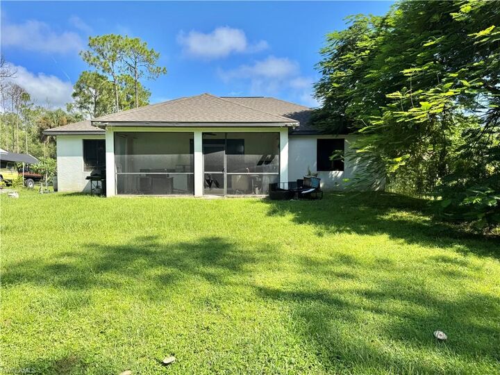 Property Photo:  3232 4th Ave SE  FL 34117 