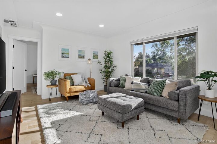 Property Photo:  1981 S Wolff Street  CO 80219 
