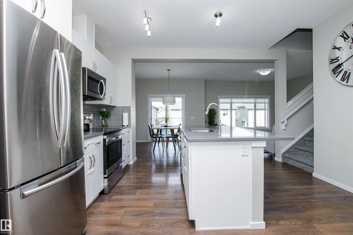 Property Photo:  26 Ambleside Way  AB T8H 1A5 