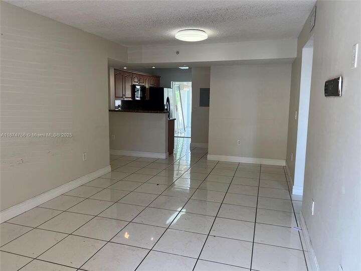 Property Photo:  7411 W 22nd Ave 104  FL 33016 