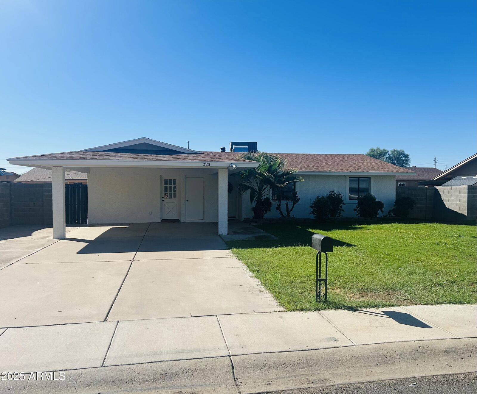 Property Photo:  323 W Olive Avenue  AZ 85233 
