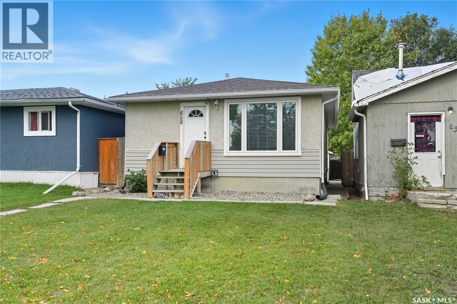 Property Photo:  658 Garnet Street  SK S4T 2W8 