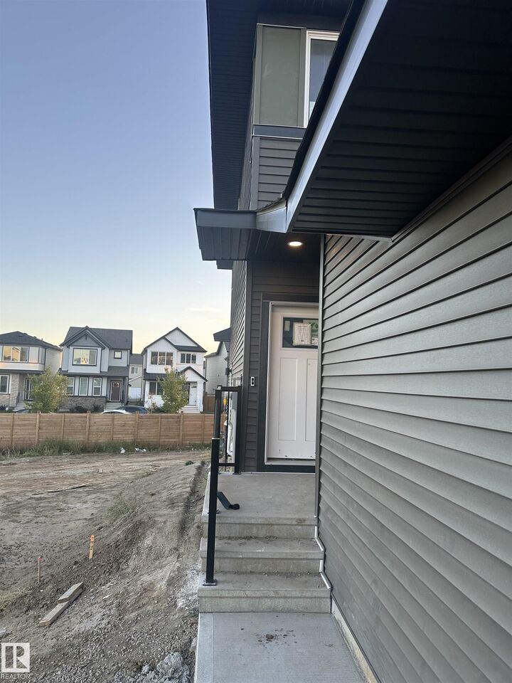 Property Photo:  8925 Elves Loop NW  AB T6M 3G3 