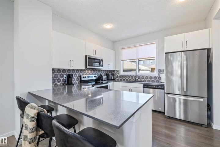 Property Photo:  2097 Maple Road NW  AB T6J 1J2 