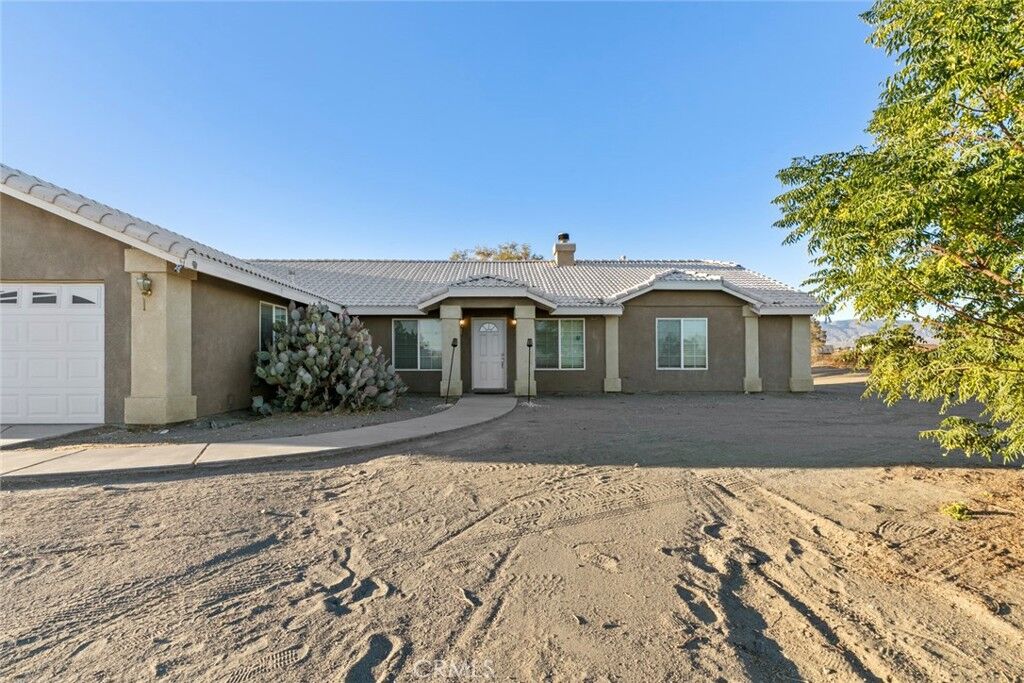Property Photo:  4427 Begonia Road  CA 92371 