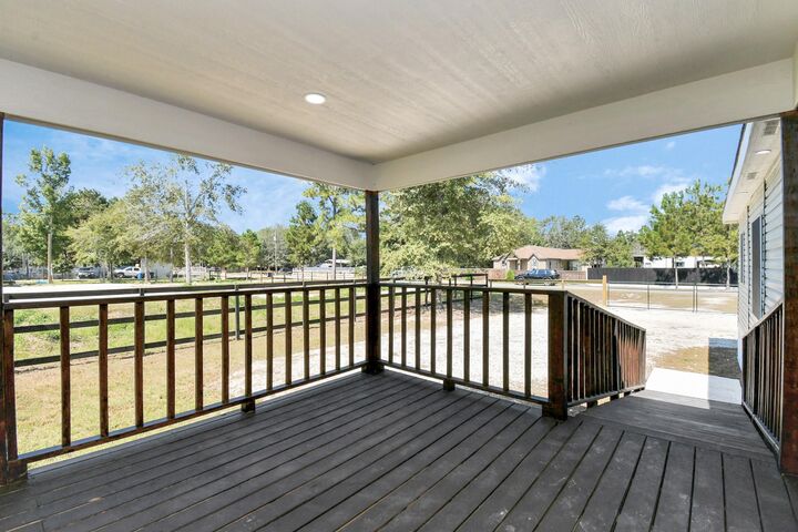 Property Photo: 422 County Road 3414 TX 77327