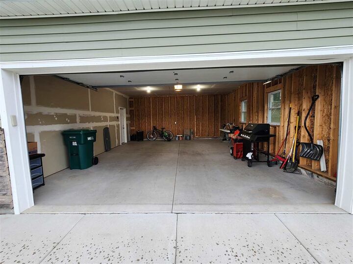 Property Photo:  940 Windsong Place  MI 49770 