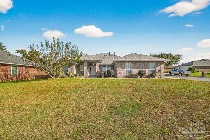 Property Photo:  6437 Sarasota St  FL 32526 