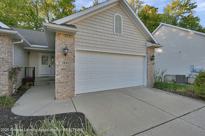 Property Photo: 1521 Nottingham Forest Trail MI 48895