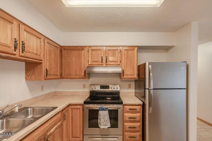 Property Photo:  1120 12th Street N # 9  ND 58501 