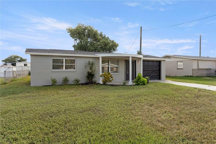 Property Photo: 9030 Unicorn Avenue FL 34668