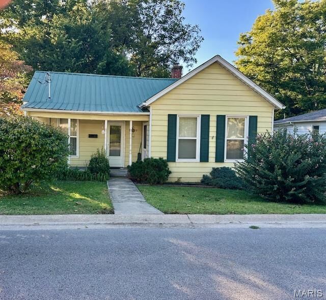 Property Photo:  211 N Russell Avenue  MO 63755 