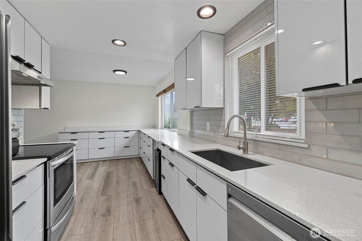 Property Photo:  8823  Holly Drive F103  WA 98208 