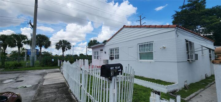 Property Photo: 405 NW 64th St FL 33150