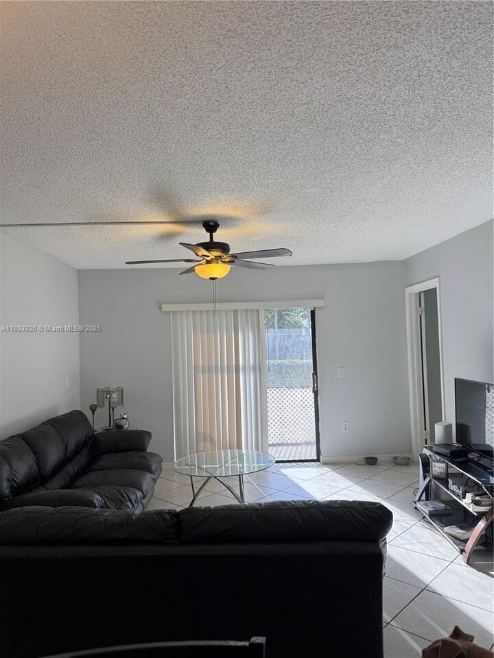 Property Photo: 142 NW 91st Ave 104 FL 33024