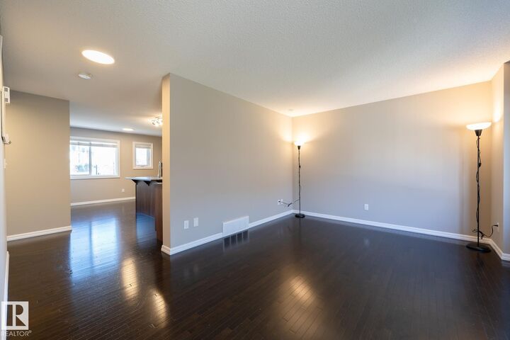 Property Photo: 655 Tamarack Road NW 103 AB T6T 0N4