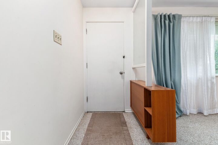 Property Photo:  12419 135A Avenue NW  AB T5L 3Z4 