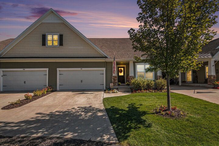 Property Photo: 702 Braeside Drive SE MI 49315