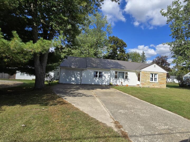 Property Photo:  133 State Street  MI 49242 