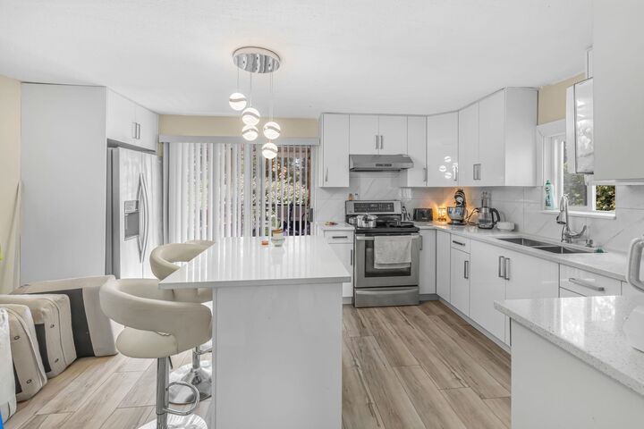 Property Photo:  13906 68 Avenue  BC V3W 2H1 