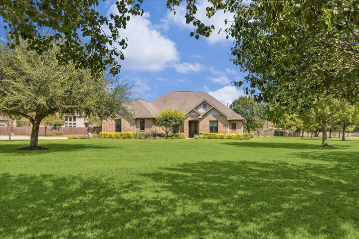 Property Photo: 21220 Skinner Ridge Lane TX 77406
