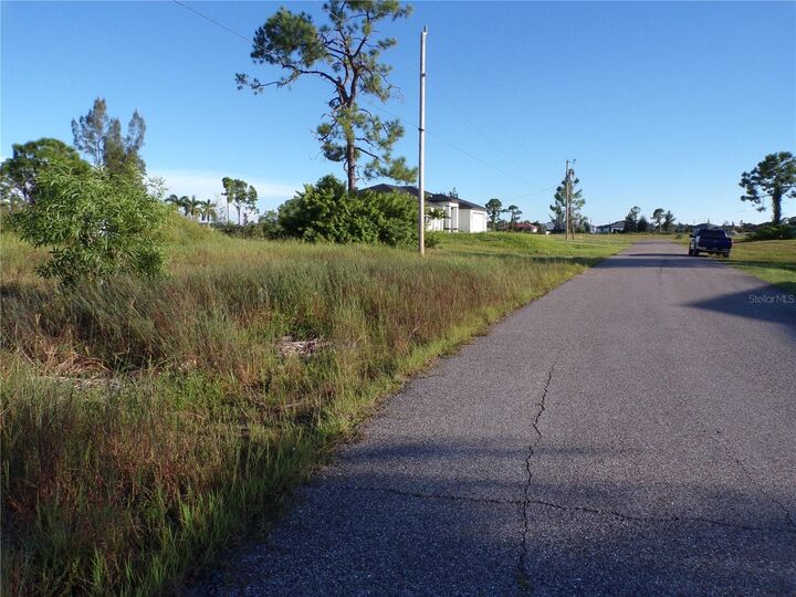 Property Photo: 2625 NW 26th Place FL 33993