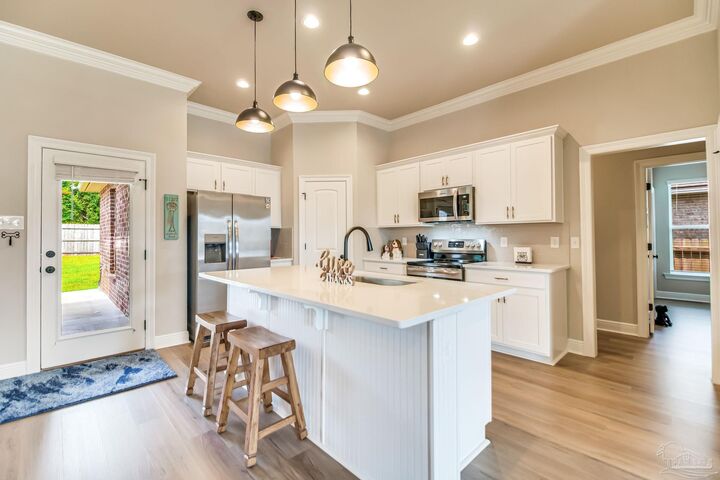 Property Photo:  4745 Sago Palm Cir  FL 32571 