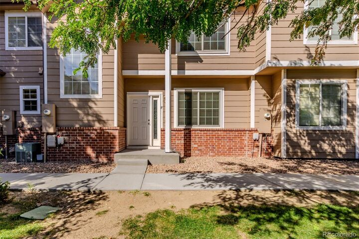 Property Photo:  6815 S Webster Street F  CO 80128 