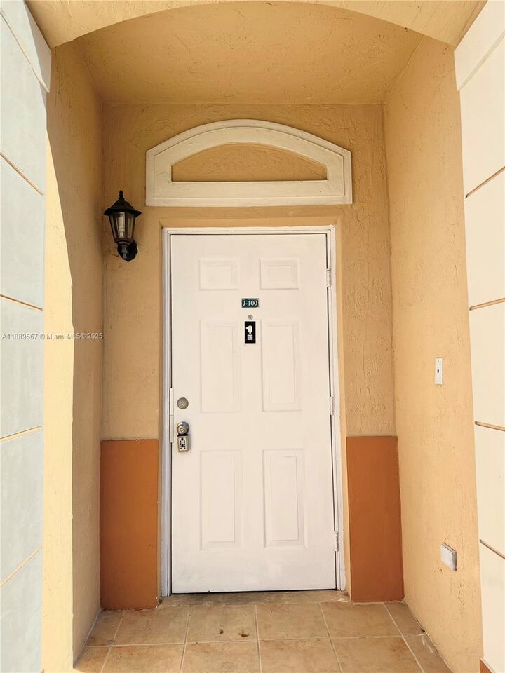 Property Photo: 7301 NW 174th Ter 100 FL 33015