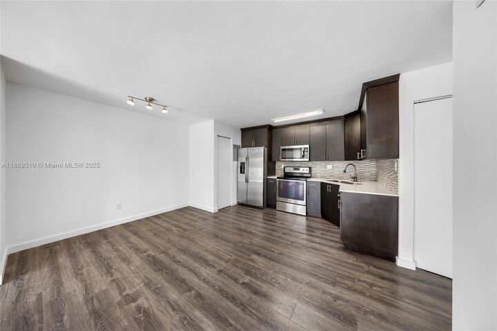 Property Photo:  4480 NW 79th Ave 2G  FL 33166 
