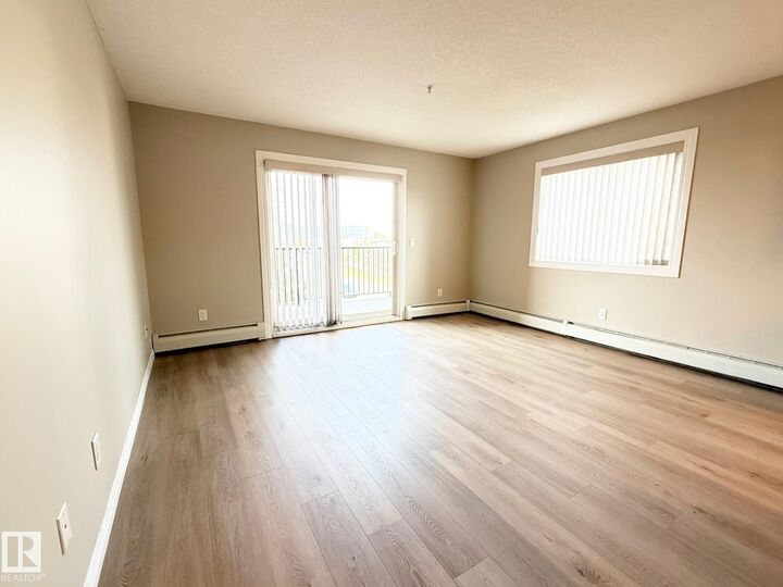 Property Photo:  9945 167 Street NW 312  AB T5P 0K5 