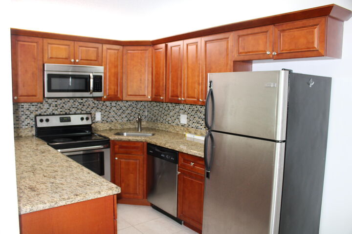 Property Photo:  1006 Green Pine Boulevard H2  FL 33409 