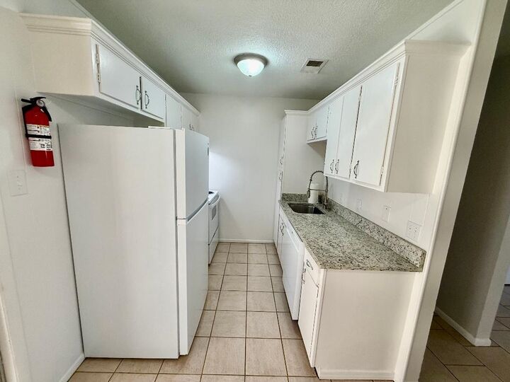 Property Photo:  6760 Prutzman Rd. Unit 11  TX 77706 