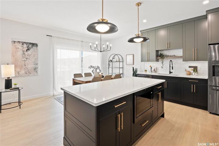 Property Photo:  166 Cockroft Manor  SK S7V 1L1 