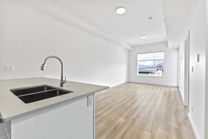 Property Photo: 11913 Burnett Street 510 BC V2X 4N1