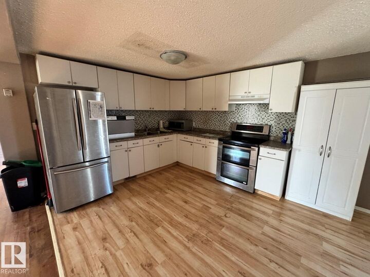 Property Photo: 10770 Winterburn Rd NW 1126 AB T5S 1T6