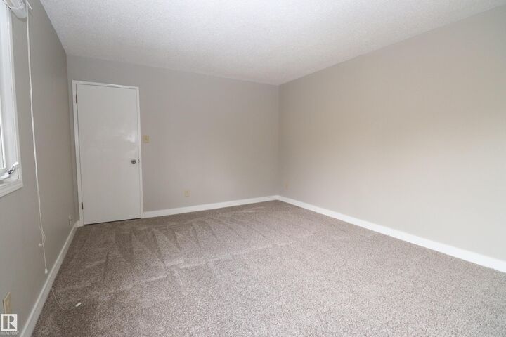 Property Photo:  14843 Riverbend Road NW D  AB T6H 5A9 