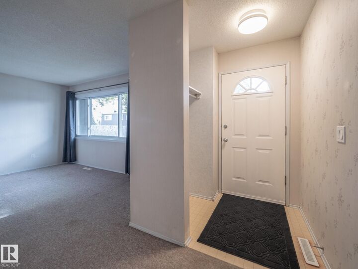 Property Photo: 14315 58 Street NW AB T5A 1N6