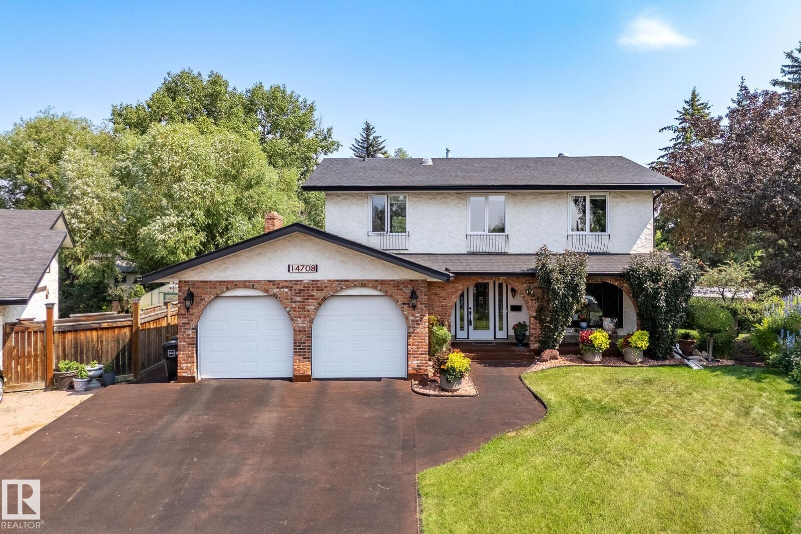 Property Photo: 14708 58 Avenue NW AB T6H 4T2