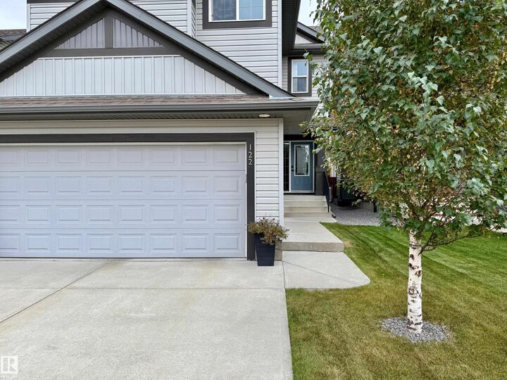 Property Photo: 122 Sunterra Way AB T8H 0T8