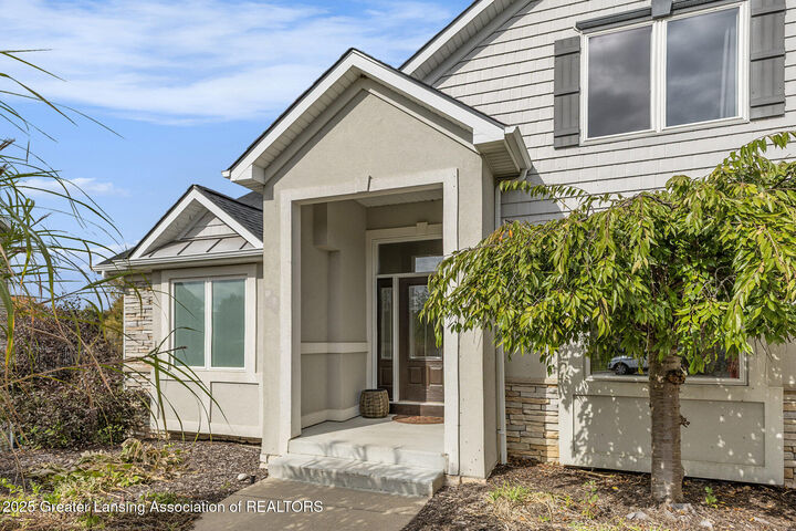 Property Photo: 1106 Cobblestone Court MI 48895