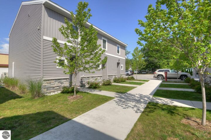 Property Photo:  1139 E Eighth Street 7  MI 49686 