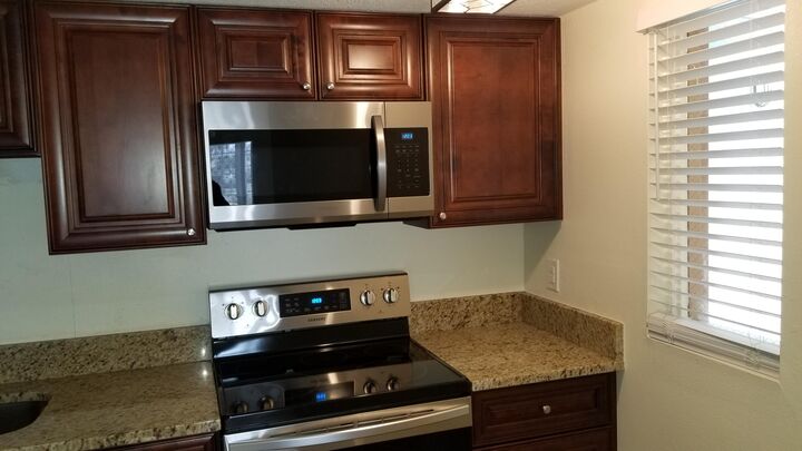 Property Photo:  1516 SE Royal Green Circle G-103  FL 34952 