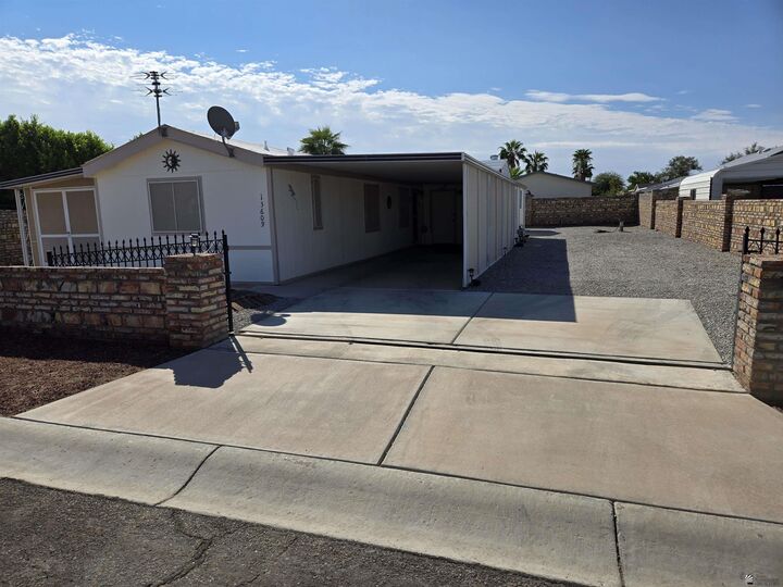 Property Photo: 13609 E 50 St AZ 85367