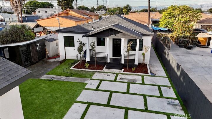 Property Photo:  1217 E 100th  CA 90002 